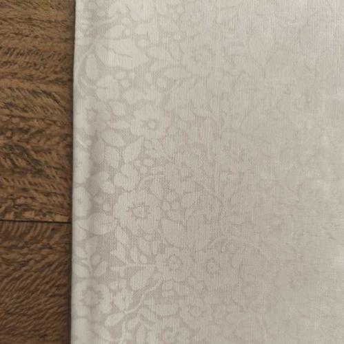 Tissu Faux uni fleurs blanches- 100% Coton -  au mètre