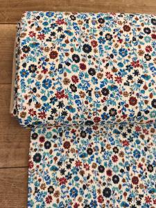 Tissu Double gaze Fantaisie -fond écru fleurs bleues- au mètre 